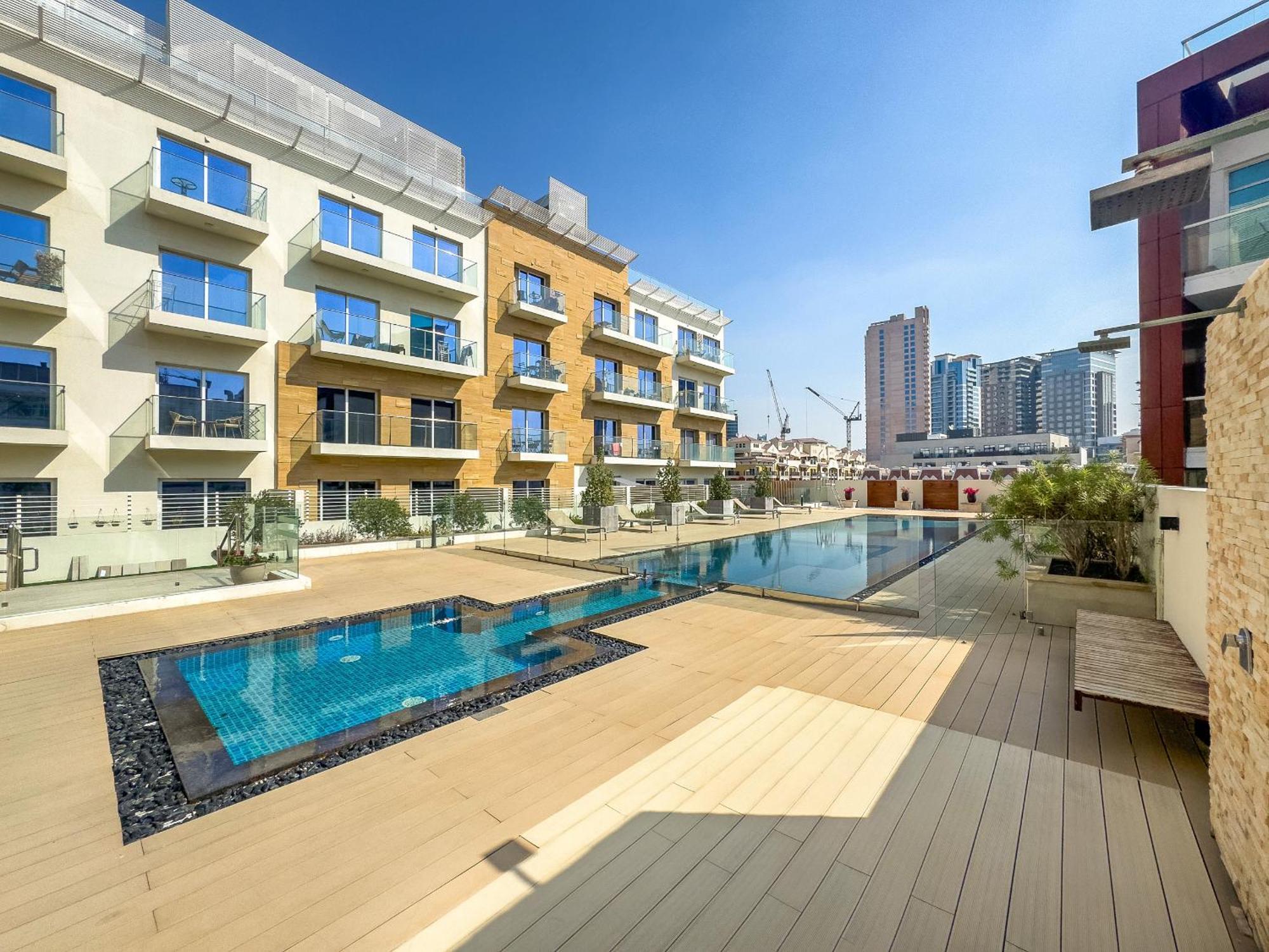 Vayk - Modern With Pool Views In Jvc * Dubai